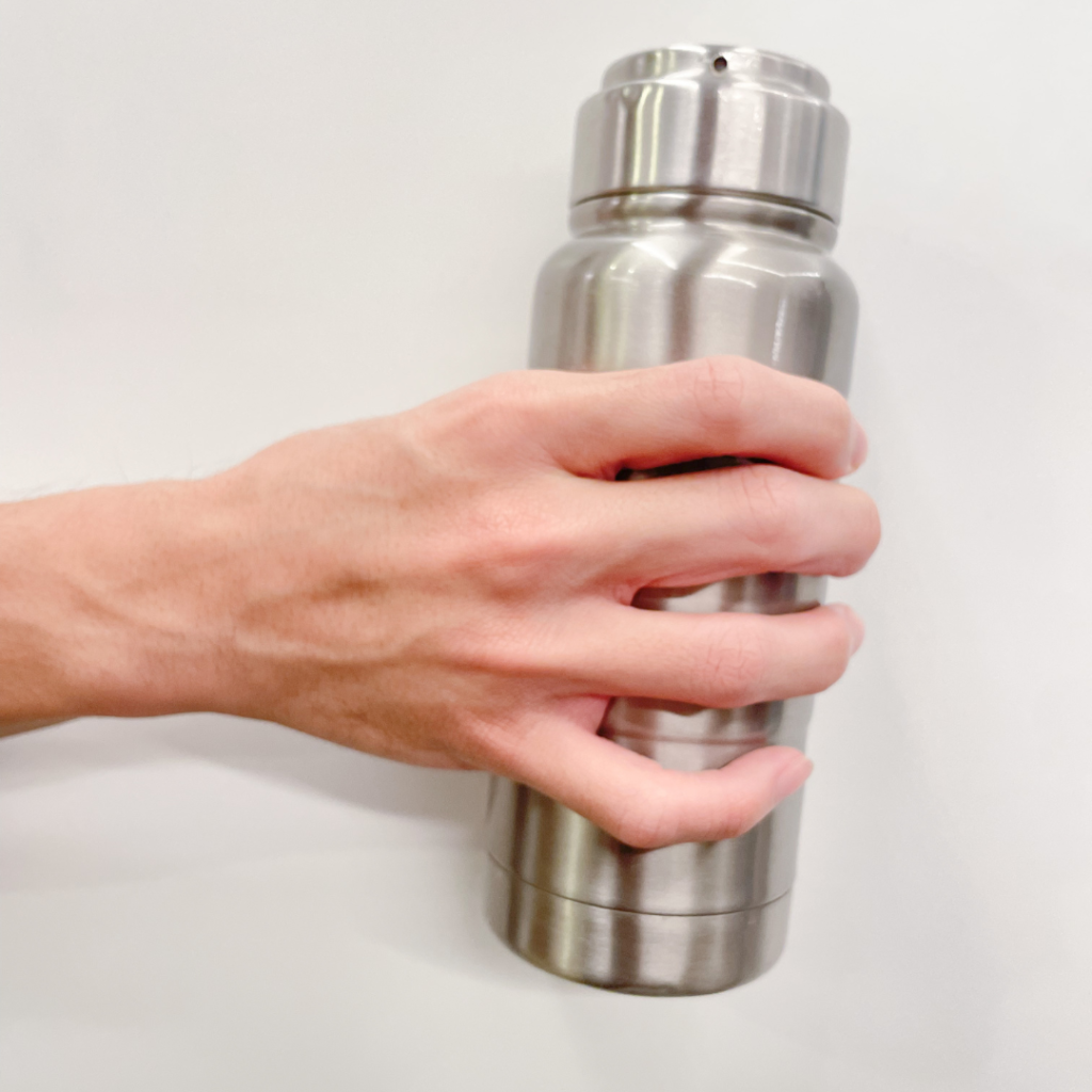 Tennis Elbow Stretches_Wrist Stretches with water bottle_Healing Hands Chiropractic