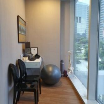 chiropractor room with stretching ball